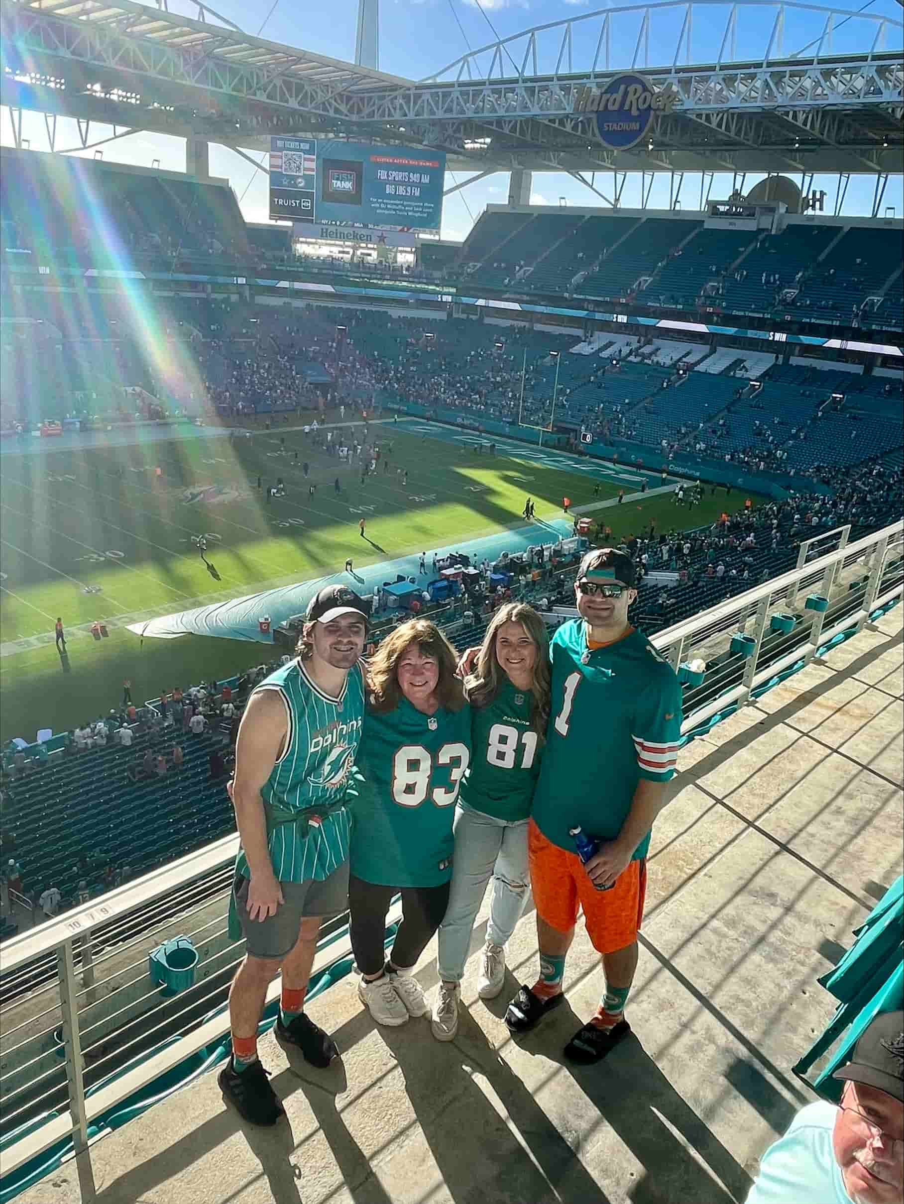 Lara's family picture in a stadium